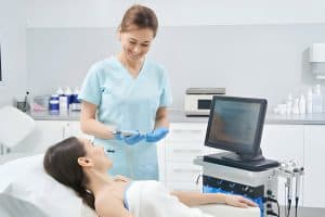 Beautician performing Hydrafacial Treatments in clinic